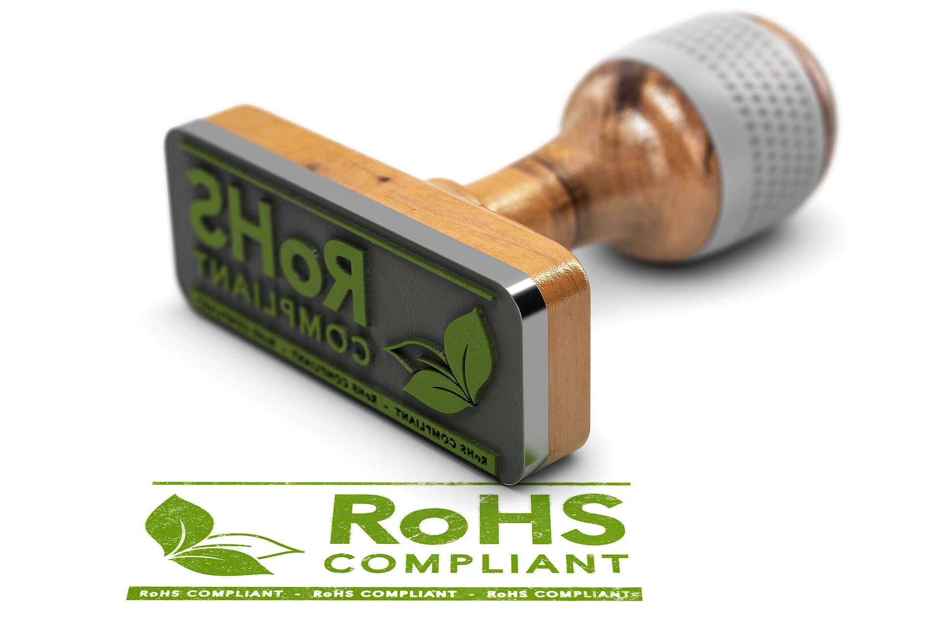 A wooden stamp with the ROHS logo that stands for the certification